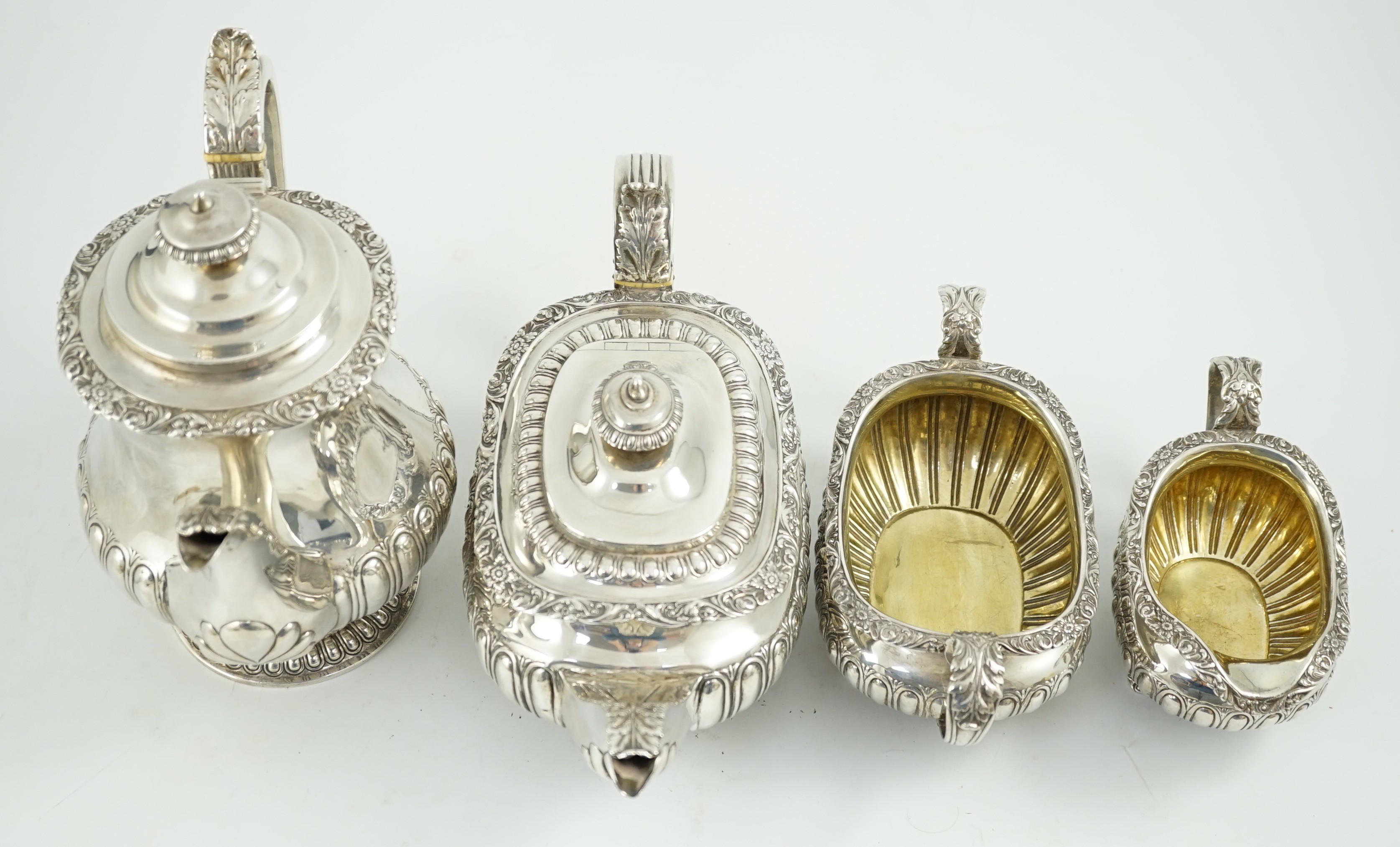 A George IV four piece demi fluted silver tea and coffee service, by Joseph Angell I